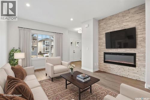 2960 Green Turtle Road, Regina, SK - Indoor Photo Showing Living Room With Fireplace