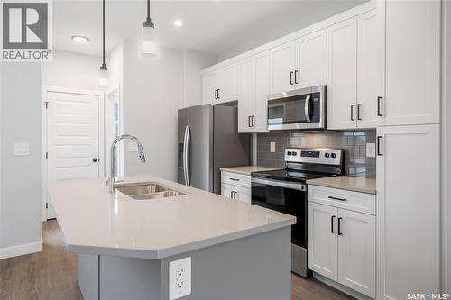 2960 Green Turtle Road, Regina, SK - Indoor Photo Showing Kitchen With Double Sink With Upgraded Kitchen
