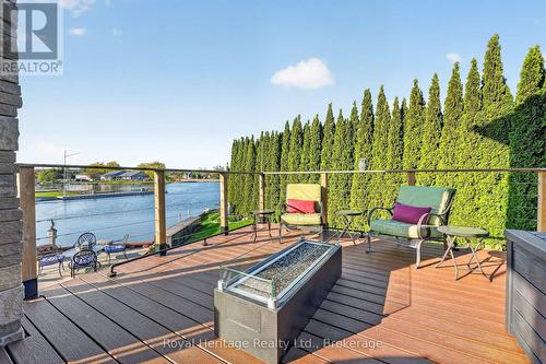 32 Edgewater Drive, Brighton, ON - Outdoor With Body Of Water With Deck Patio Veranda