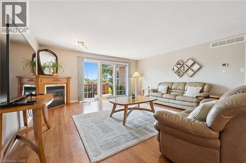 Living area featuring hardwood flooring. - 187 Westchester Drive, Kitchener, ON - Indoor Photo Showing Living Room With Fireplace