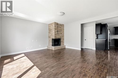 4008 Regina Avenue, Regina, SK - Indoor Photo Showing Living Room With Fireplace