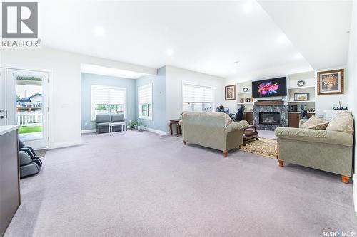 733 Gowan Road, Warman, SK - Indoor Photo Showing Living Room With Fireplace