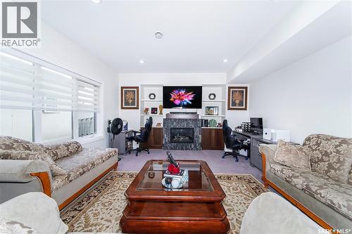 733 Gowan Road, Warman, SK - Indoor Photo Showing Living Room With Fireplace