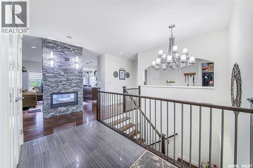 733 Gowan Road, Warman, SK - Indoor Photo Showing Other Room With Fireplace