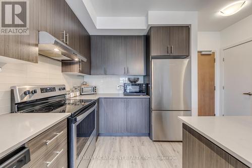 303 - 320 Plains Road E, Burlington, ON - Indoor Photo Showing Kitchen