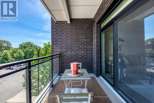303 - 320 Plains Road E, Burlington, ON - Outdoor With Balcony With Exterior