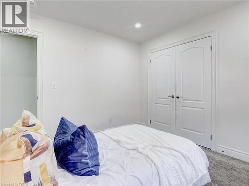 Bedroom featuring plush gray carpet, white walls, and a recessed ceiling light - 584 Pinery Trail, Waterloo, ON - Indoor Photo Showing Bedroom