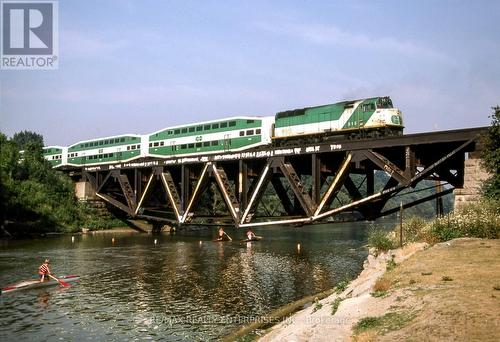 Go Train from Port Credit Go Station - 1571 Muir Road, Mississauga, ON - Outdoor With Body Of Water