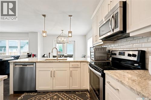 207 Kolynchuk Manor, Saskatoon, SK - Indoor Photo Showing Kitchen With Stainless Steel Kitchen With Upgraded Kitchen