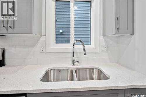 2921 Green Turtle Road, Regina, SK - Indoor Photo Showing Kitchen With Double Sink