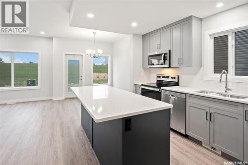 2921 Green Turtle Road, Regina, SK - Indoor Photo Showing Kitchen With Double Sink With Upgraded Kitchen