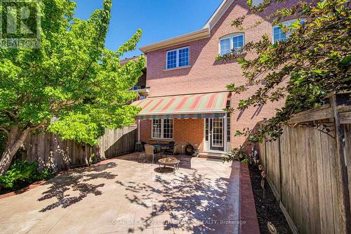 backyard with awning - 3885 Eglinton Avenue, Mississauga, ON - Outdoor With Deck Patio Veranda