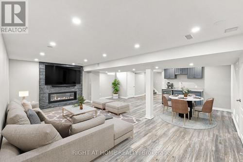 179 Cachet Boulevard, Whitby, ON - Indoor Photo Showing Living Room With Fireplace