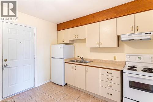 718 Ross Street Unit# 2, Burlington, ON - Indoor Photo Showing Kitchen With Double Sink