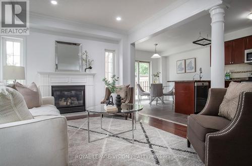 2 Laprade Square, Clarington, ON - Indoor Photo Showing Living Room With Fireplace