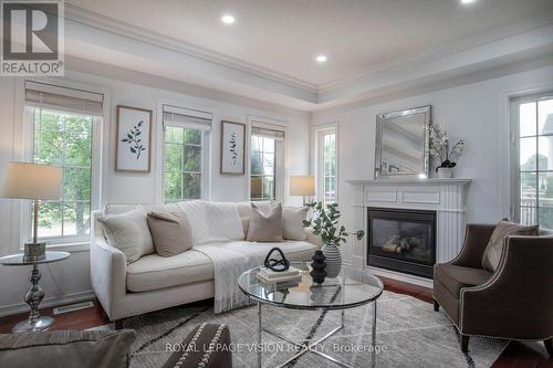 2 Laprade Square, Clarington, ON - Indoor Photo Showing Living Room With Fireplace
