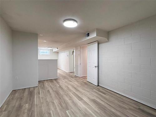 Lower level Living Room - 534 20Th Street, Brandon, MB - Indoor Photo Showing Other Room