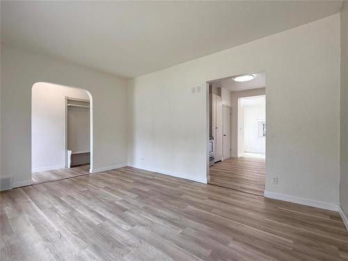New Vinyl Plank Flooring Throughout the Home - 534 20Th Street, Brandon, MB - Indoor Photo Showing Other Room