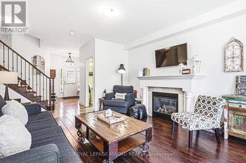 32 Dulgaren Street, Hamilton, ON - Indoor Photo Showing Living Room With Fireplace