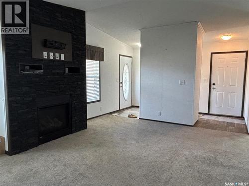 7 2004 Alice Road, Estevan, SK - Indoor With Fireplace
