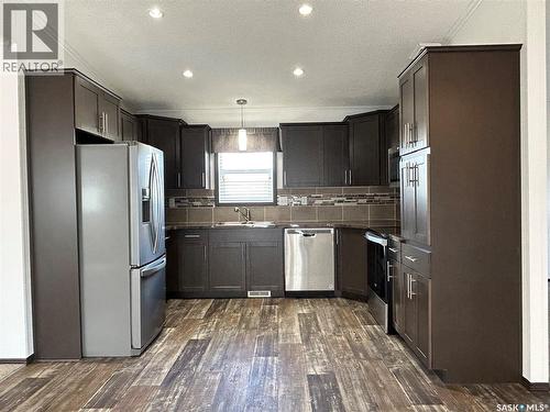 7 2004 Alice Road, Estevan, SK - Indoor Photo Showing Kitchen With Stainless Steel Kitchen