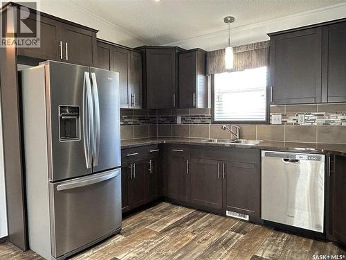 7 2004 Alice Road, Estevan, SK - Indoor Photo Showing Kitchen With Stainless Steel Kitchen With Double Sink
