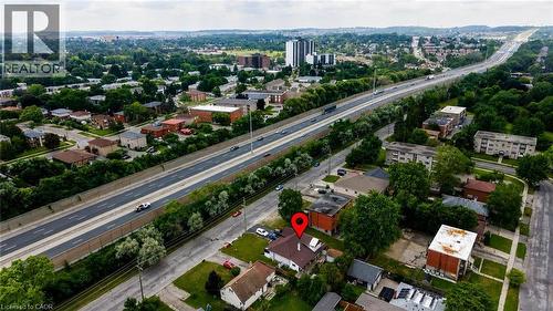 Aerial perspective of a neighborhood featuring residential structures and mature trees - 182 Avalon Place, Kitchener, ON - Outdoor With View