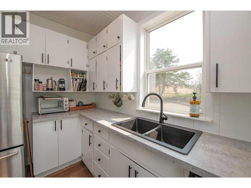 9211 6 Highway, Coldstream, BC - Indoor Photo Showing Kitchen With Double Sink