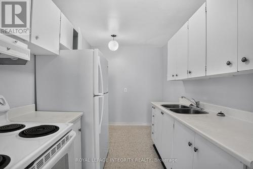 606 - 2000 Jasmine Crescent, Ottawa, ON - Indoor Photo Showing Kitchen With Double Sink