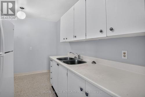 606 - 2000 Jasmine Crescent, Ottawa, ON - Indoor Photo Showing Kitchen With Double Sink