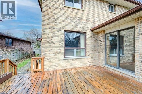 Expansive wood-finish deck with integrated stairs and wood railing - 27 Walmer Gardens, London, ON - Outdoor With Deck Patio Veranda With Exterior