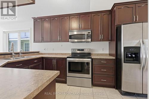 91 Lynch Circle E, Guelph, ON - Indoor Photo Showing Kitchen With Stainless Steel Kitchen With Double Sink