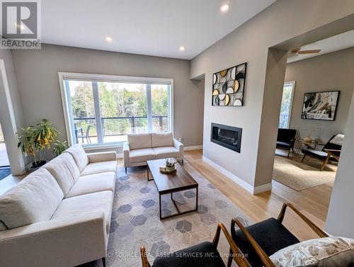 183 Ambrous Crescent, Guelph, ON - Indoor Photo Showing Living Room With Fireplace