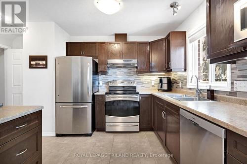 Kitchen - 41 - 2145 North Routledge Park, London North (North E), ON - Indoor Photo Showing Kitchen With Double Sink