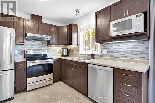 Kitchen - 41 - 2145 North Routledge Park, London North (North E), ON - Indoor Photo Showing Kitchen With Stainless Steel Kitchen With Double Sink