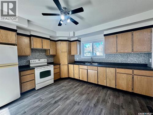21 James Avenue, Yorkton, SK - Indoor Photo Showing Kitchen With Double Sink