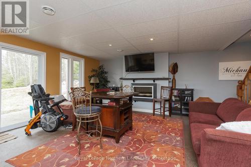 1055E Argo Run, Mattawan, ON - Indoor With Fireplace