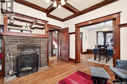 1037 Chestnut Avenue, Moose Jaw, SK - Indoor Photo Showing Living Room With Fireplace