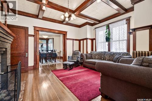 1037 Chestnut Avenue, Moose Jaw, SK - Indoor Photo Showing Living Room With Fireplace