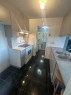 Kitchen - 405-4570 Ch. Des Cageux, Laval (Chomedey), QC  - Indoor Photo Showing Kitchen With Double Sink 