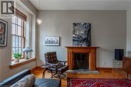 212 Bay Street S, Hamilton, ON - Indoor With Fireplace