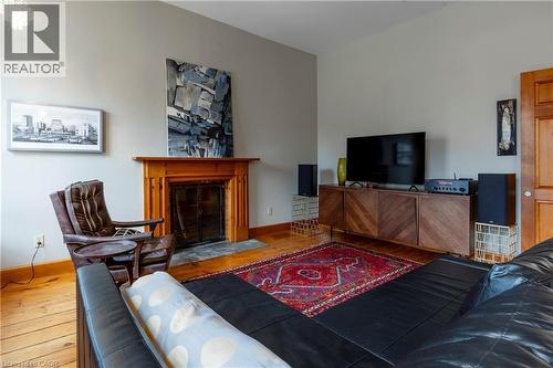 212 Bay Street S, Hamilton, ON - Indoor Photo Showing Living Room With Fireplace