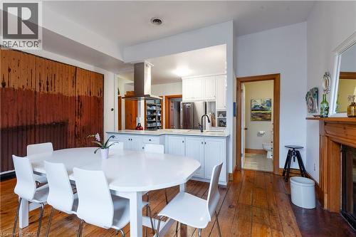 212 Bay Street S, Hamilton, ON - Indoor Photo Showing Dining Room With Fireplace