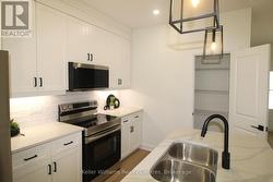 Photos of similar builder unit, images reversed. - 