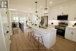 Photos of similar builder unit, images reversed. - 