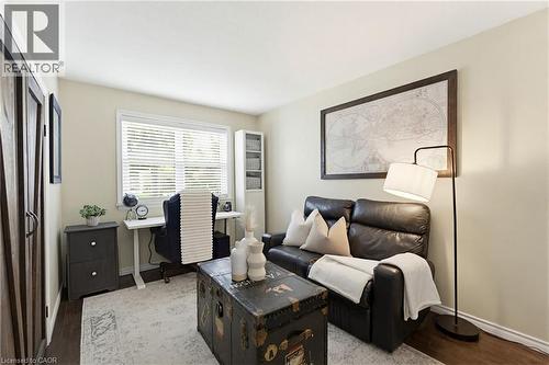 Interior room featuring wood-finish flooring and light neutral wall tones - 60 Avenue Road, Cambridge, ON - Indoor