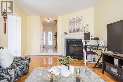 Family Room - Fireplace view - 4810 Rathkeale Road, Mississauga, ON - Indoor Photo Showing Living Room With Fireplace