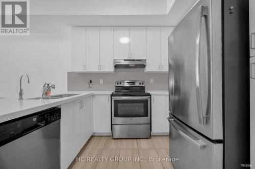 13 - 2212 Bromsgrove Road, Mississauga, ON - Indoor Photo Showing Kitchen With Double Sink