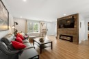 Salon - 148 Ch. Du Roi, Saint-Hippolyte, QC  - Indoor Photo Showing Living Room With Fireplace 