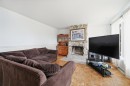 Salon - 6315 Av. Pinard, Saint-Hyacinthe, QC  - Indoor Photo Showing Living Room With Fireplace 